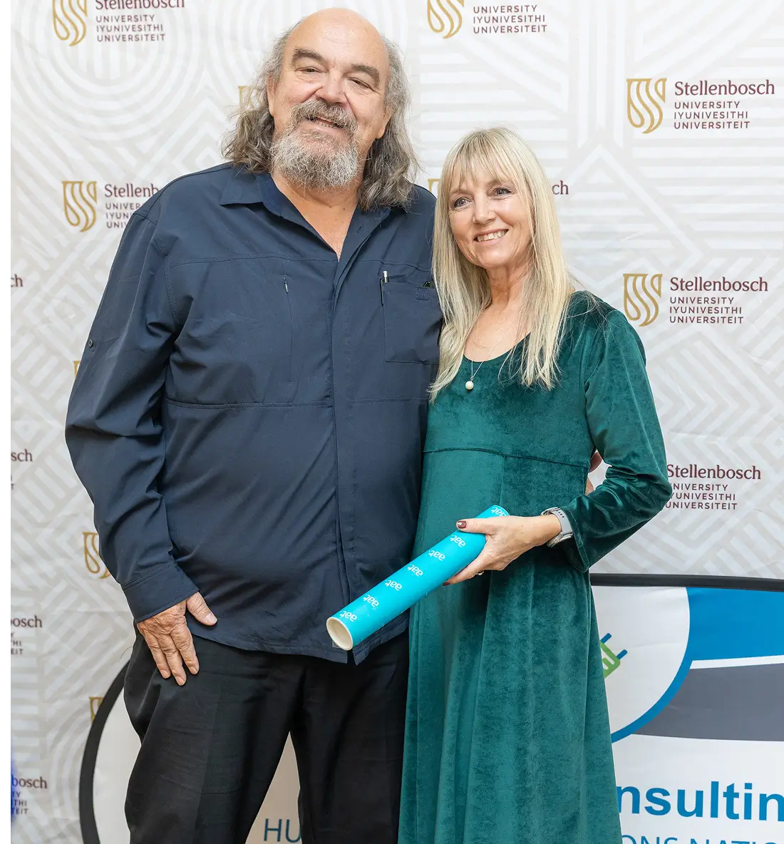 Anton standing at a podium giving a speech.